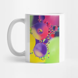 Colorful close up of oil drops in water Mug